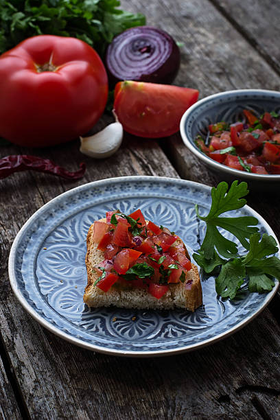 istock Mexican  tomato salsa sauce  and toasts 540599412