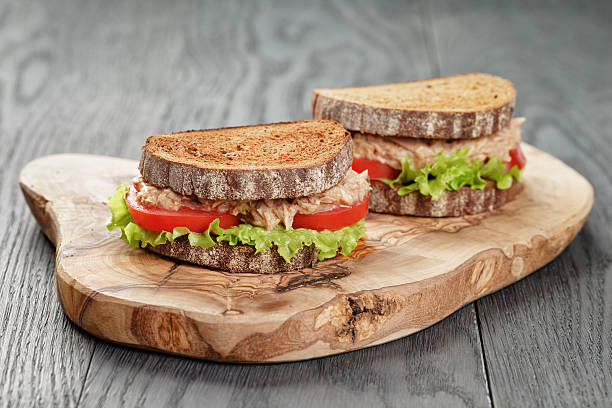 Rye Bread Sandwich With Tuna And Vegetables Stock Photo - Download Image Now - Tuna - Seafood, Sandwich, Rye - Grain - iStock