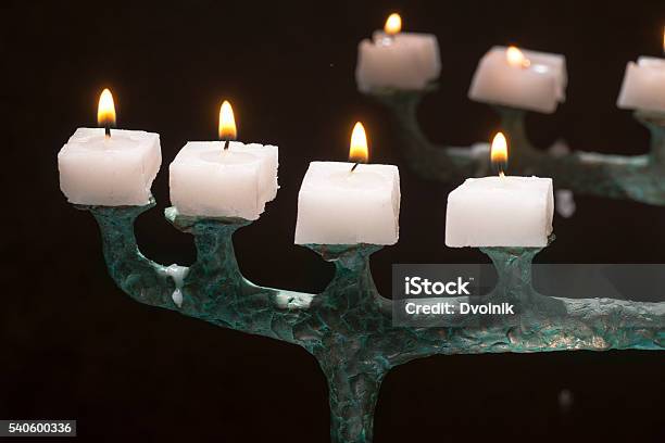 Small Candles Burning On A Copper Candlestick Stock Photo - Download Image Now - Burning, Candle, Candlestick Holder