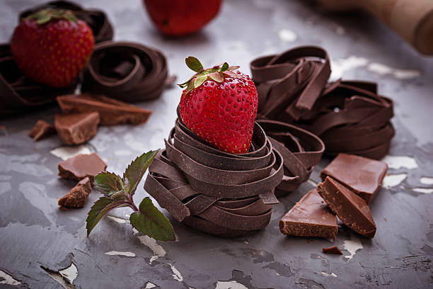 istock Uncooked chocolate pasta and strawberry 540600504