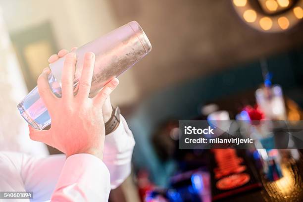 Bartender Preparing Cocktail In The Shaker Stock Photo - Download Image Now - Bartender, Shaking, Cocktail