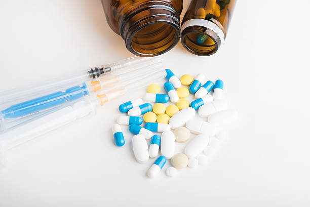 istock Medicines, supplements and syringes white background. 540603394