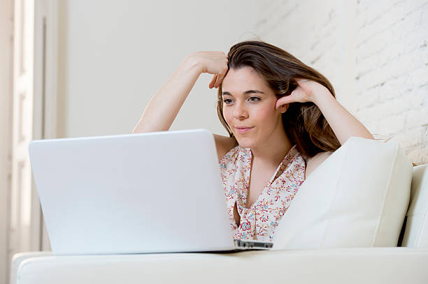 istock young beautiful woman working with laptop computer smiling happy 540603800