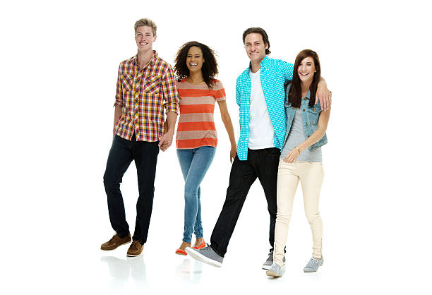 istock Four friends walking together 540604340