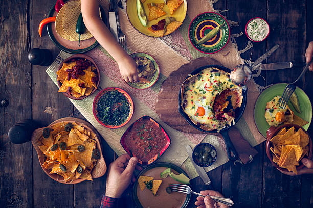 istock Eating Mexican Eggs and Tortilla Chips with Salsa and Jalapenos 540605728