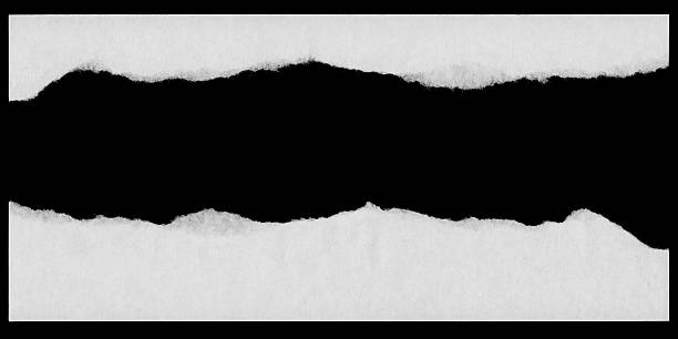 istock Torn White Paper Edges Isolated on Black Background 540607506