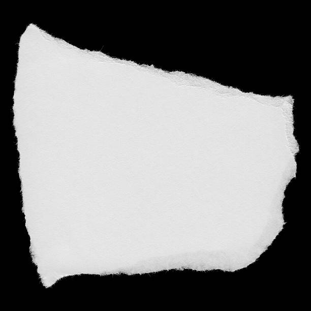 istock Torn White Paper Scrap Isolated on Black Background 540607582