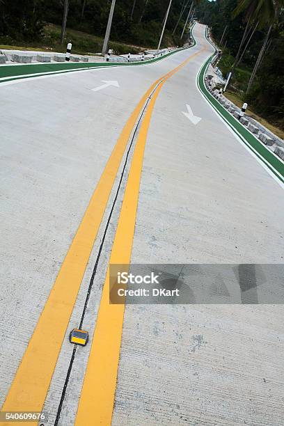 Winding Road Stock Photo - Download Image Now - Aiming, Arrow Symbol, Asphalt