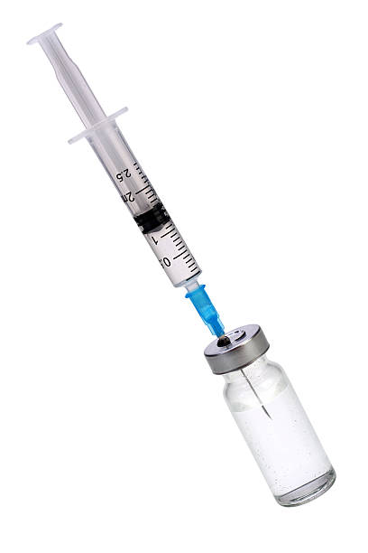 istock Syringe and medicine bottle 540611390