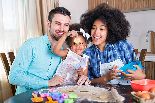 istock Young happy family baking together 540716904