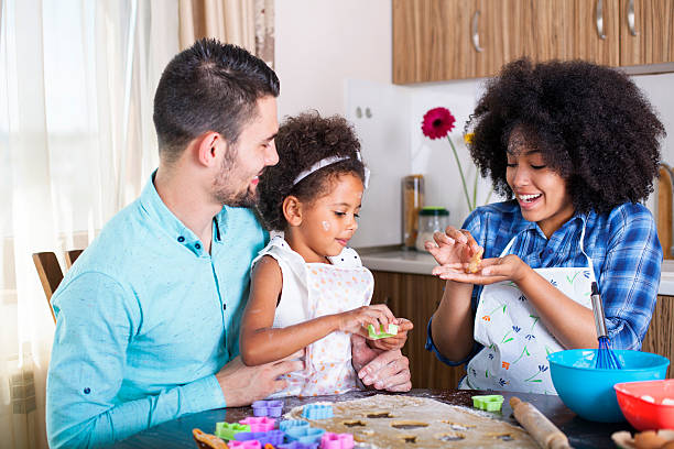 istock Young happy family baking together 540716916