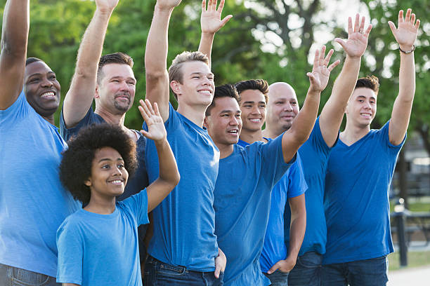 istock Multi-ethnic group of fathers and sons in blue shirts 540717138
