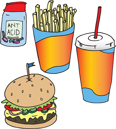 A delicious meal of a cheeseburger, french fries and a soda drink from a fast food restaurant.  For desert is a bottle of antacids for the aftermath turning in your stomach.