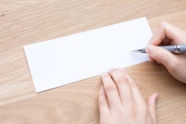 istock businessman writing on white paper 540718646