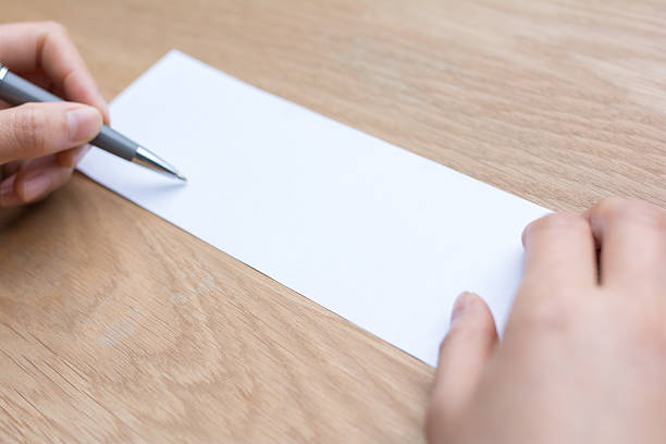 istock businessman writing on white paper 540718660