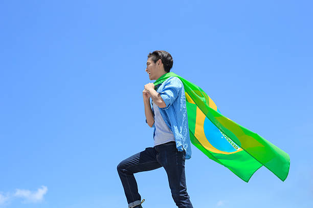 istock Excited man holding brazil flag 540721074