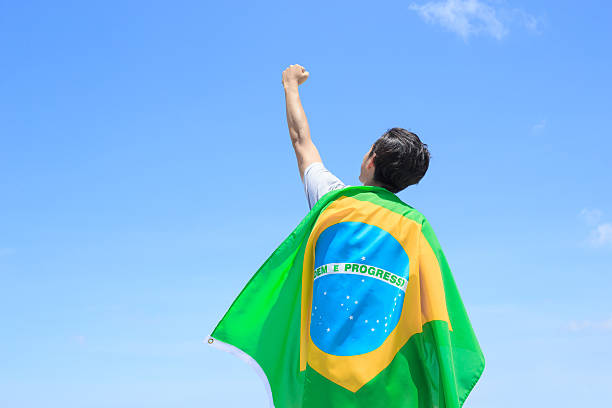istock Excited man holding brazil flag 540721238