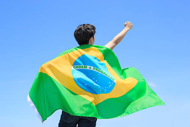 istock Excited man holding brazil flag 540721258
