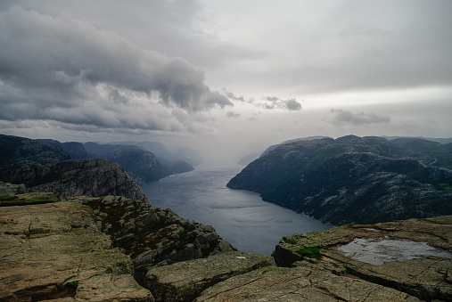 View of Lysefjord fjord from cliff Preikestolen or Prekestolen, also known as Preacher's Pulpit or Pulpit Rock , Forsand, Ryfylke, Norway