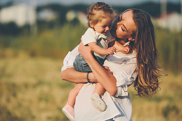 istock mother and daughter on a rural road 540723730