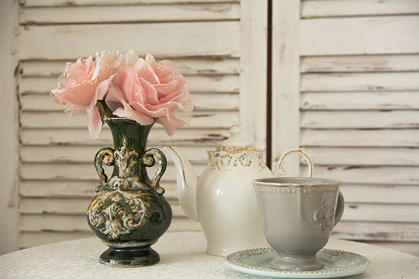 istock On table a tea set and flowers in vase 540724578