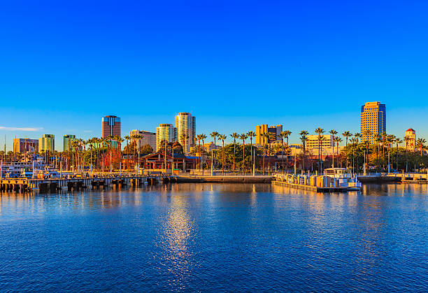 Long Beach Harbor with skyline and clear skies, CA Long Beach Harbor with skyline with waterfront and clear skies, CA long beach california photos stock pictures, royalty-free photos & images