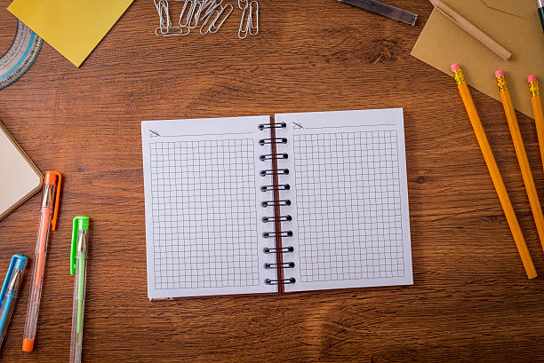 istock Background wood table with school supplies 540730972