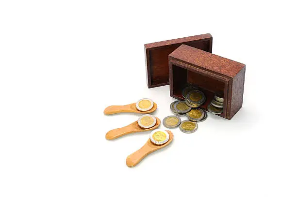 Photo of money, thai coins bath and wooden box on white background