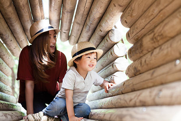 Parent-child playing with fun in the tunnel