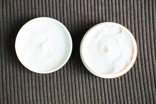 istock hair wax and clay in tubs 540734934