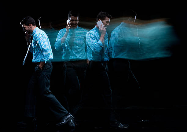 istock Multiple Exposure - Businessman talking on phone 540736438