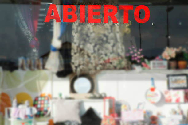 istock Open sign in spanish language on a shop window. 540736692
