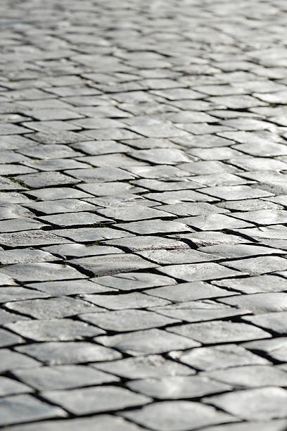 Grey stone cobblestone background stock photo