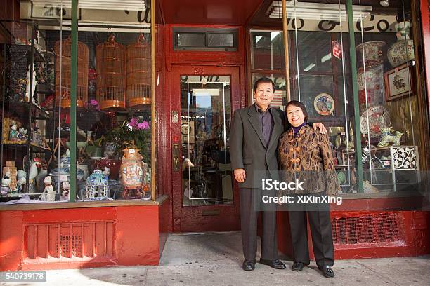 Asian Family In Front Of Store Stock Photo - Download Image Now - New York City, Immigrant, Small Business