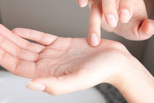 istock Cleaning contact lenses before putting them on 540739914
