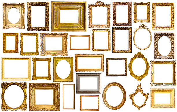 assortment of art frames assortment of golden and silvery art and photo frames isolated on white background frame stock pictures, royalty-free photos & images