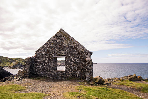 istock Moray Firth coast viewed through wall of ruin 540740576