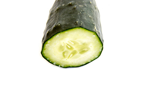 istock Slice of cucumber isolated on white 540740750
