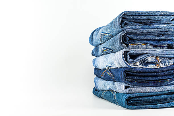 jeans on a white background. - stack rock imagens e fotografias de stock