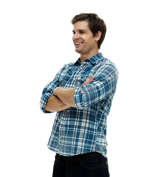 istock Smiling casual man standing with arms crossed 540741860