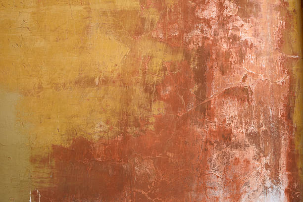 Old weathered and worn stucco wall stock photo