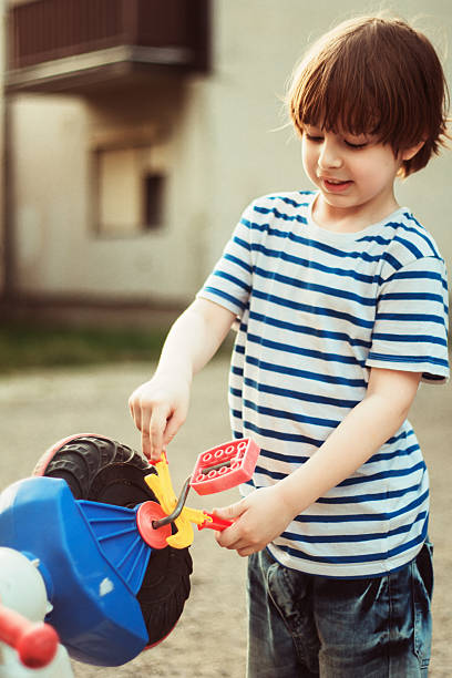 istock fixing my bike 540742250