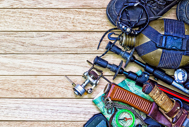 istock Camping gear, on wooden background. 540743302