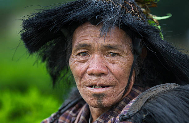 Portrait of an elderly Black Hmong woman at the Can Cau Market in Lao Cai Province, Vietnam