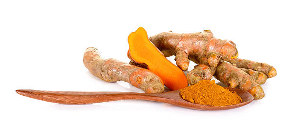 istock Turmeric with wood spoon powder 540745188