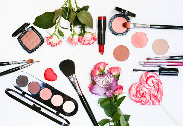 istock Composition with makeup cosmetics, brushes, shadoes and flowers on white 540745536