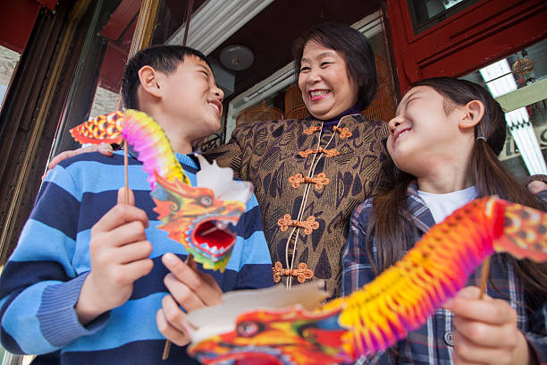 istock Asian family in front of store 540746382