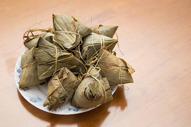 istock Traditional Duanwu Chinese rice dumplings stacked on plate 540749470