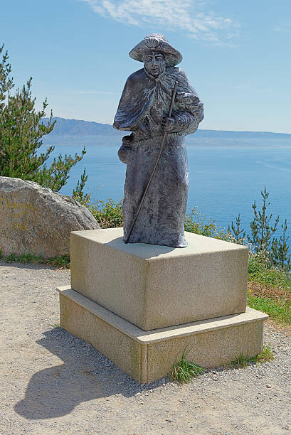 istock Pilgrim statue at Cape Finisterre, Galicia, Spain 540750512