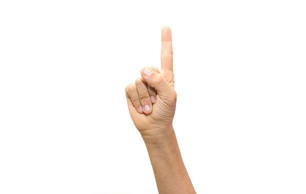 istock Child held up his index finger over white background 540757346